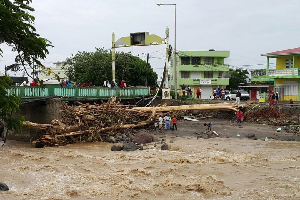 Tropical Storm Erika left a trail of destruction in Dominica on Friday. Photo: EPA