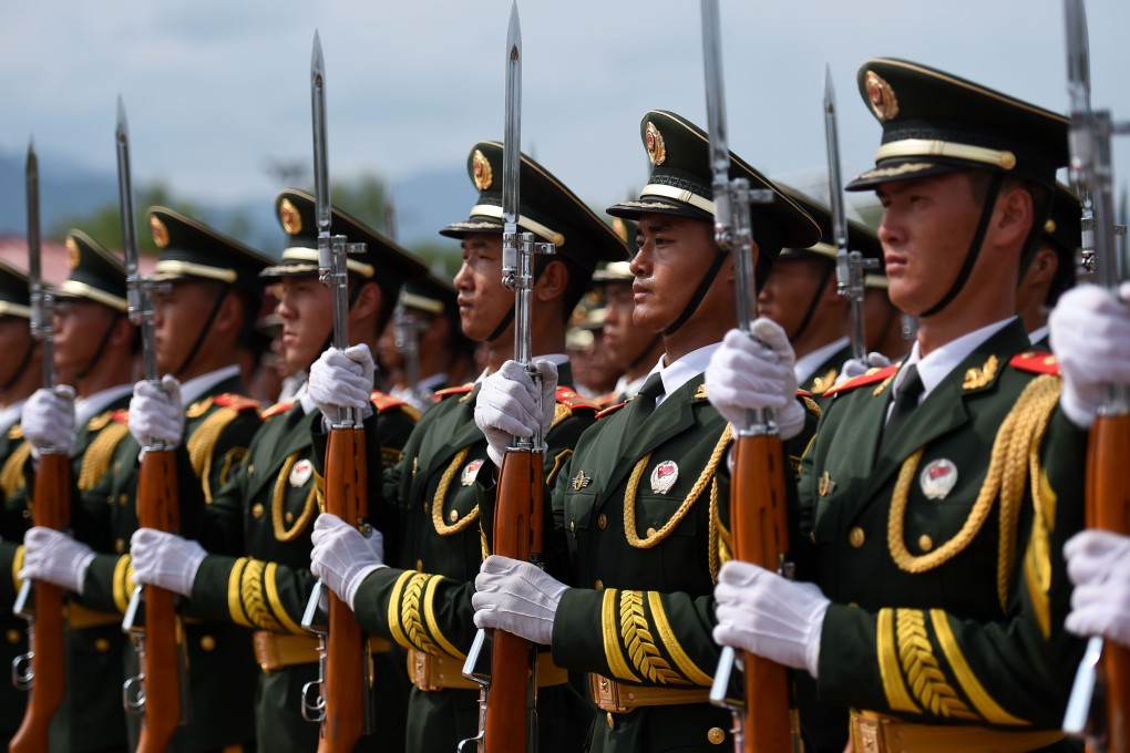 Soldiers take part in a training at a training base in Beijing ahead of next week's military parade to commemorate the end of the war. Photo: Xinhua