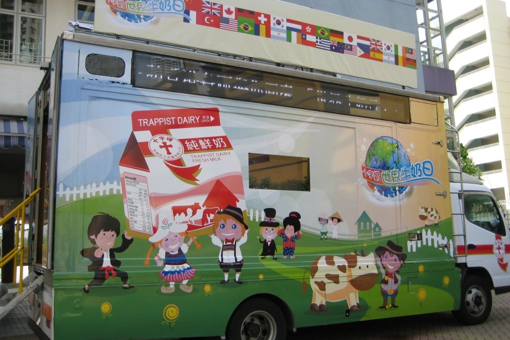 A Trappist Dairy milk truck promotes the brand in Hong Kong. Fresh tests by the government last night revealed tainted Trappist Dairy milk containing 260 times the safe legal limit for bacteria. Photo: SCMP Pictures