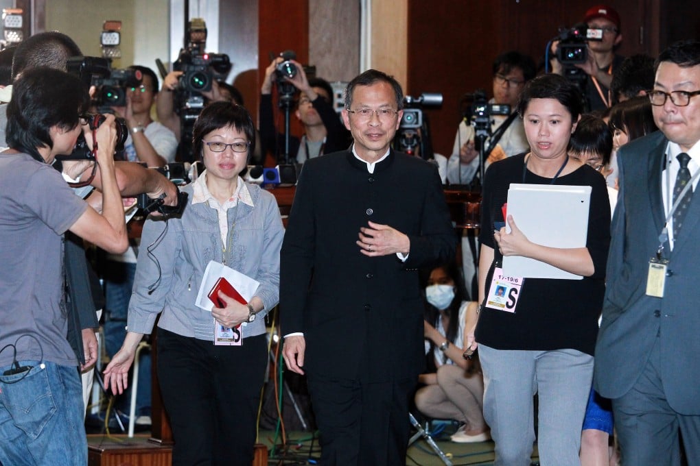 Legco president Jasper Tsang (centre) following the bungled walk-out from the chamber in June. Photo: May Tse
