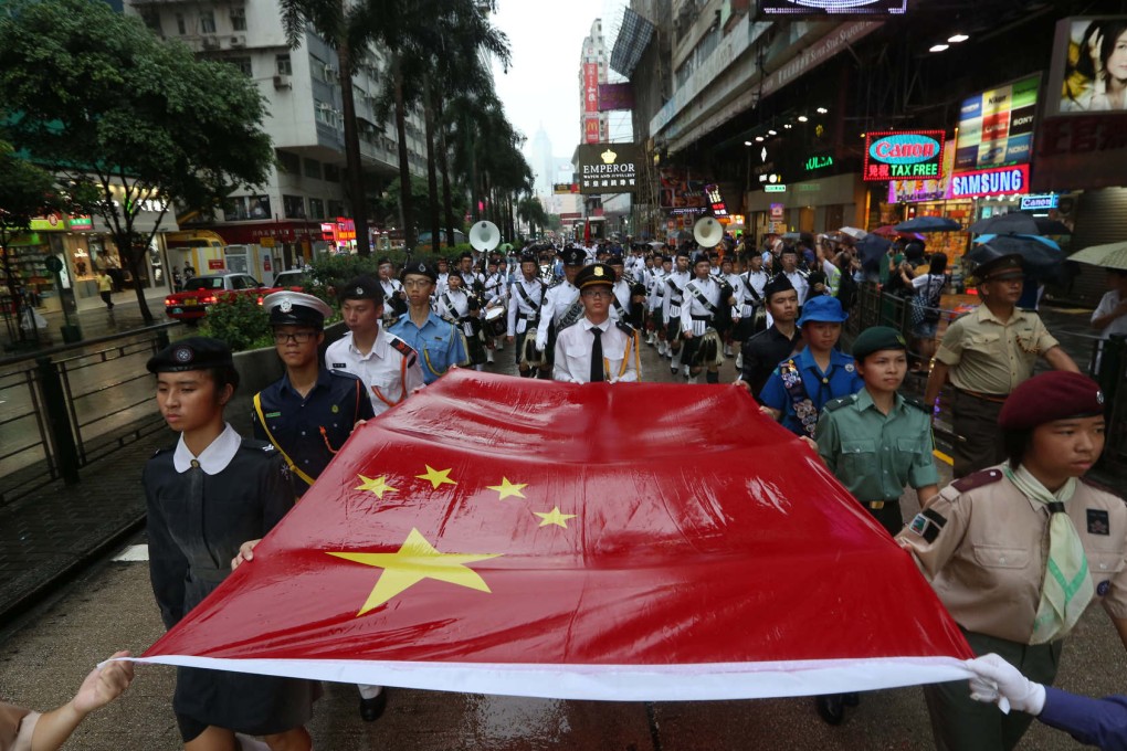 A parade to mark Japan’s withdrawal from Hong Kong in 1945 made its way through Tsim Sha Tsui.  Photo: Nora Tam