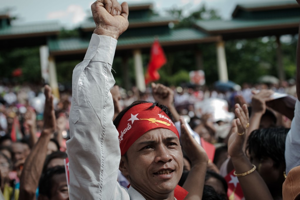 Supporters of the National League for Democracy attend an election rally in Thanlyin Township, on the outskirts of Yangon. Photo: AFP