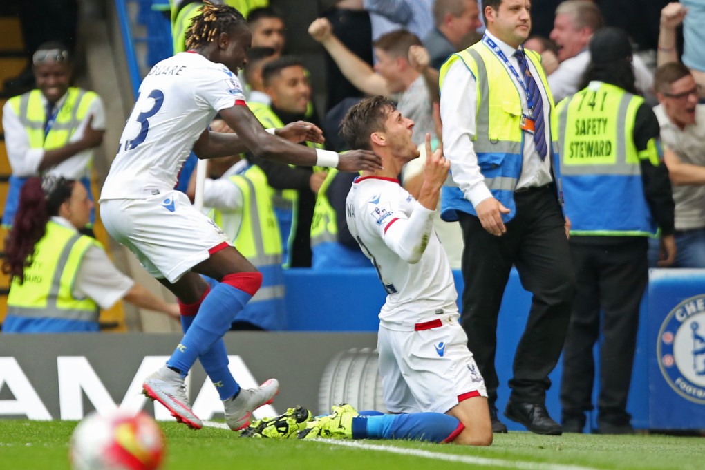 Joel Ward celebrates with Pape Souare after scoring the match-winner in Crystal Palace's 2-1 win over Chelsea at Stamford Bridge. Photo: Reuters