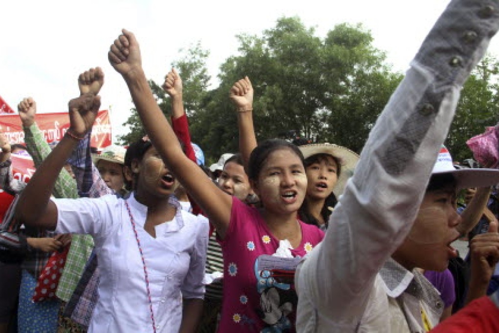 Myanmar factory workers stage a rally in Hlaingtharyar township, in suburb of Yangon. Photo: AP