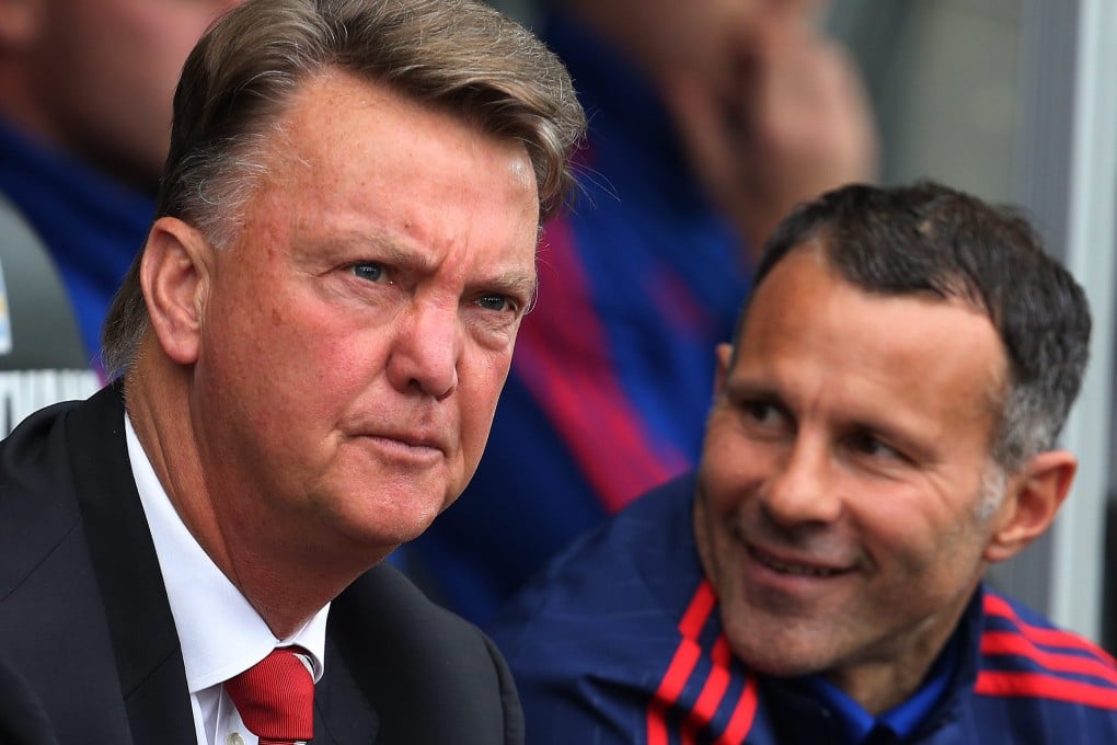 Ryan Giggs and Louis van Gaal consider their options. Photo: EPA