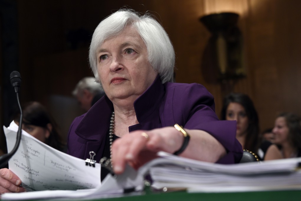 Federal Reserve Chair Janet Yellen prepares to testify before the Senate Banking Committee as she prepares to make a decision on raising rates for the first time in a decade. Photo: AP