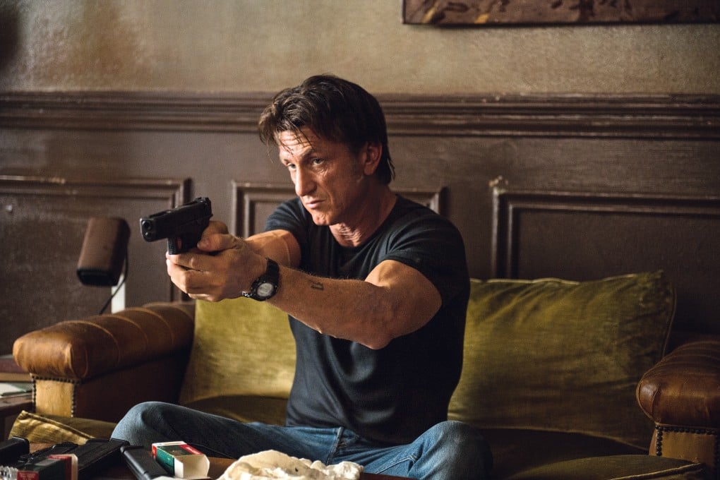 Sean Penn in The Gunman (Category: IIB). Also starring Ray Winstone and Javier Bardem, the film is directed by Pierre Morel