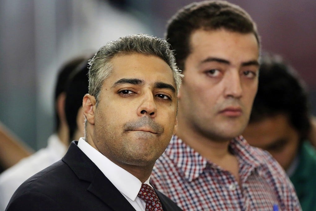 Canadian Al-Jazeera English journalist Mohammed Fahmy, left, and his Egyptian colleague Baher Mohammed were charged with being part of former Islamist president Mohammed Morsi’s Muslim Brotherhood. Photo: AP