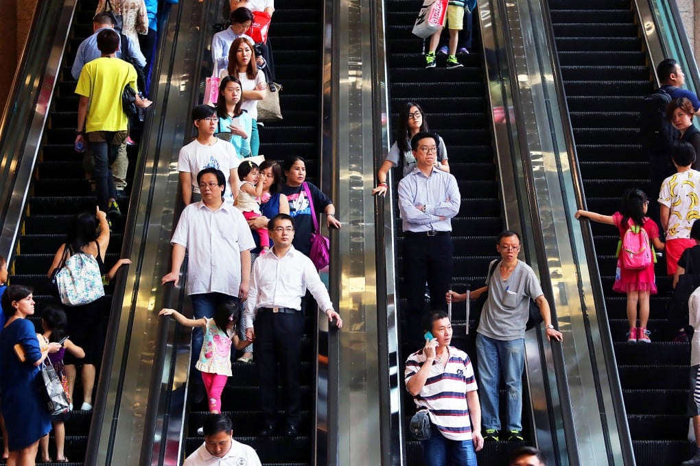 Shoppers are pictured crammed on to escalators in Causeway Bay. Photo: SCMP Pictures