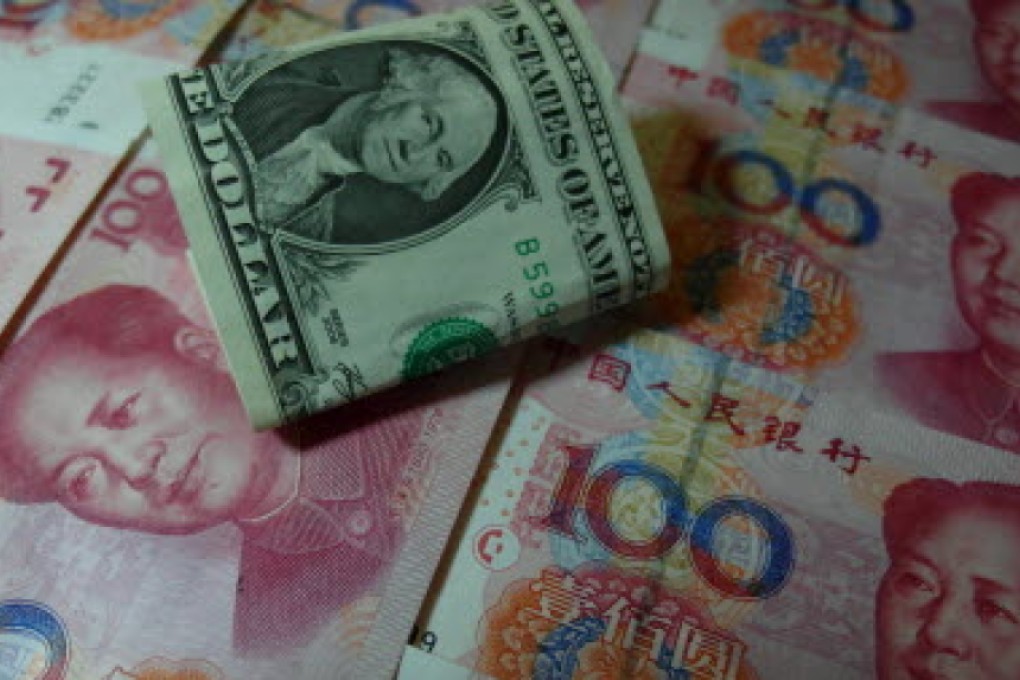 By adopting a free-market exchange-rate regime like the currency board system in Hong Kong, Beijing would dump instability and embrace stability. Photo: AFP