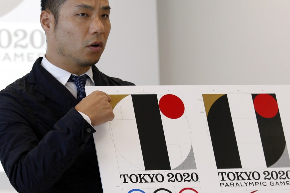 Japanese designer Kenjiro Sano with his controversial logo. Photo: AP