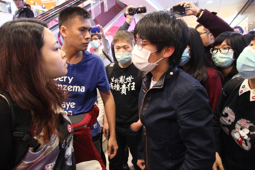 Protesters clash with a mainland Chinese traveller during a netizen-organized rally against parallel trading in Tuen Mun in February. Photo: Dickson Lee