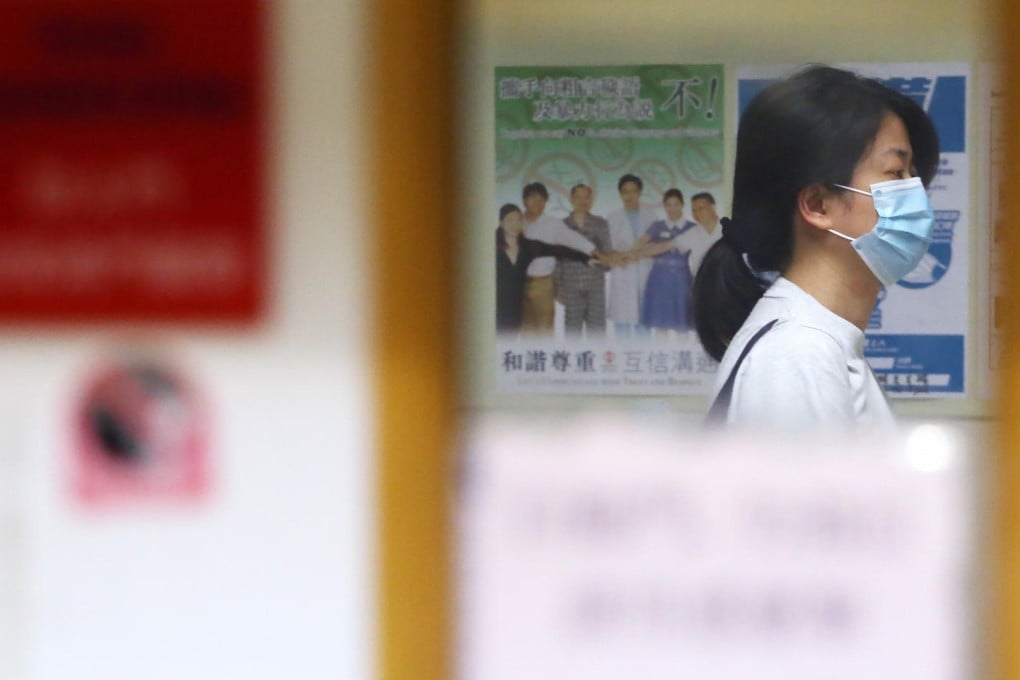 The wife of the liver patient waits at the Queen Mary Hospital.Photo: Felix Wong
