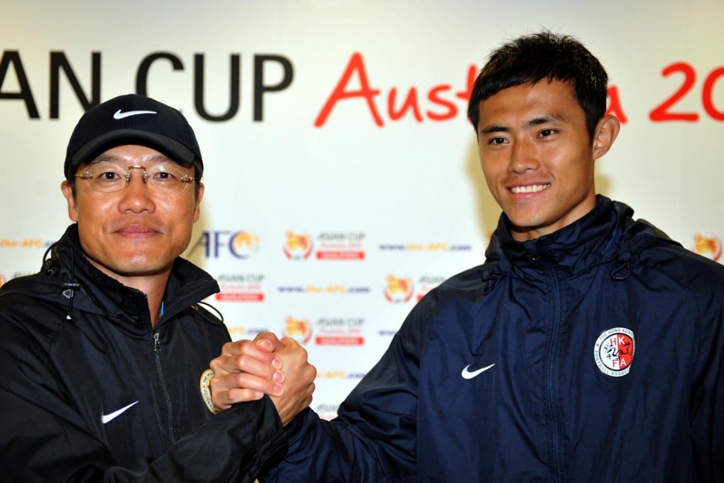 Hong Kong coach Kim pan-gon with Chan Wai-ho. Kim believes China will be tough opponents, who are strong in attack. Photos: Xinhua