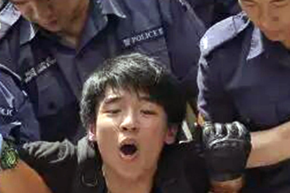 Law Cheuk-yung during his arrest. Photo: SCMP Pictures