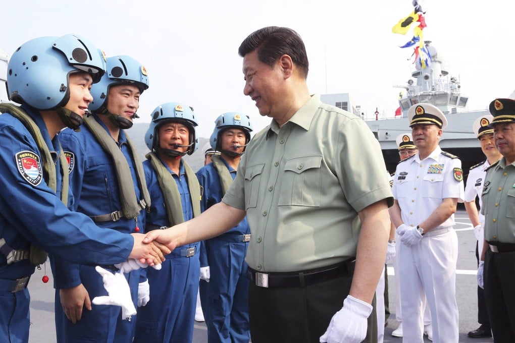 President Xi Jinping meets navy personnel in Sanya. PLA reform will boost the navy's role relative to the army's. Photo: Xinhua