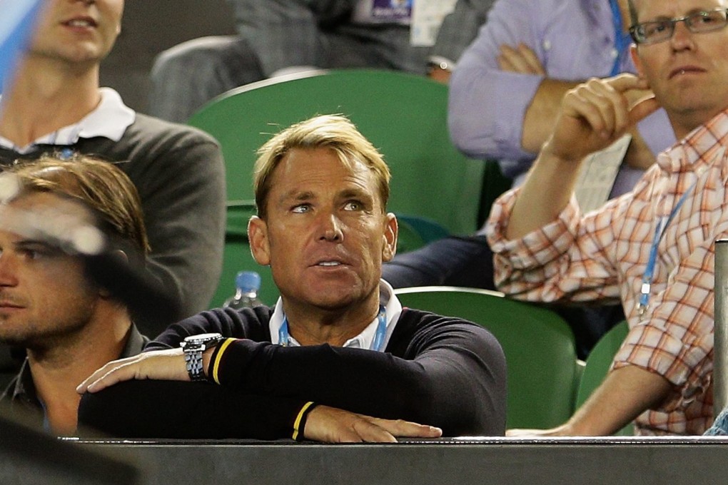 Australian cricketer Shane Warne has been spotted watching tennis matches before. Photo: EPA