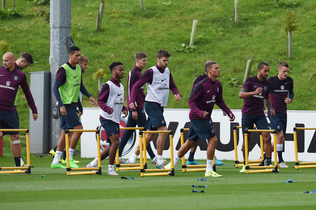 England players take part in a team training session ahead of their game against group E rivals San Marino in Serravalle. Photo:  AFP