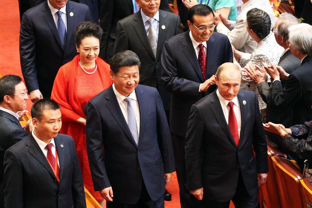 Chinese President Xi Jinping (front left) and Russia's President Vladimir Putin (front right) attend the gala marking the 70th Anniversary of the Victory of Chinese People's Resistance against Japanese Aggression and World Anti-Fascist War at the Great Hall of the People in Beijing. Photo: EPA