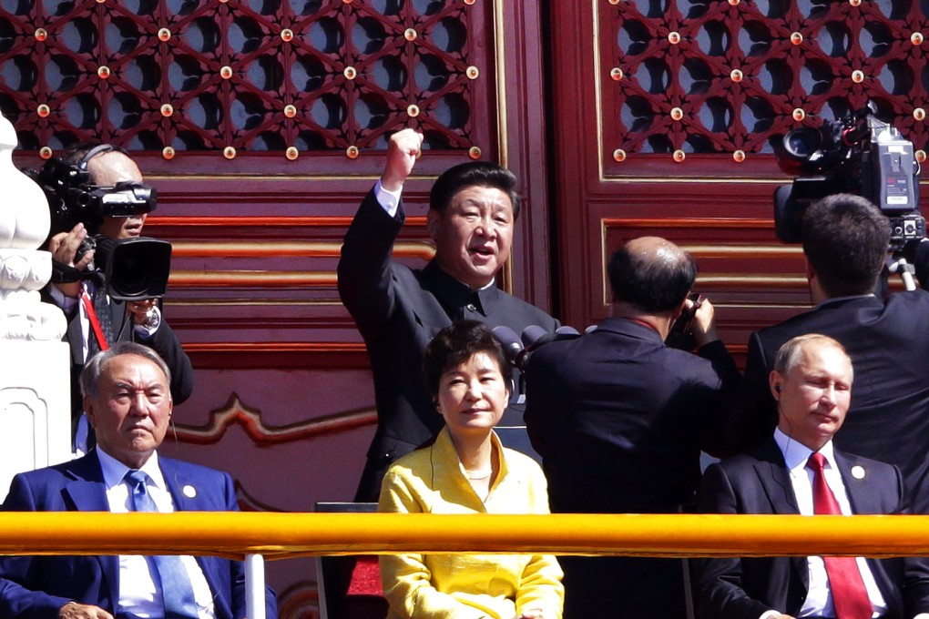 China's President Xi Jinping (centre at rear) gestures as he delivers a speech behind Russia's President Vladimir Putin (right), South Korea's President Park Geun-hye (centre) and Kazakhstan President Nursultan Nazarbayev (left)  during a military parade at Tiananmen Square in Beijing to mark the 70th anniversary of victory over Japan and the end of World War II. Photo: AFP