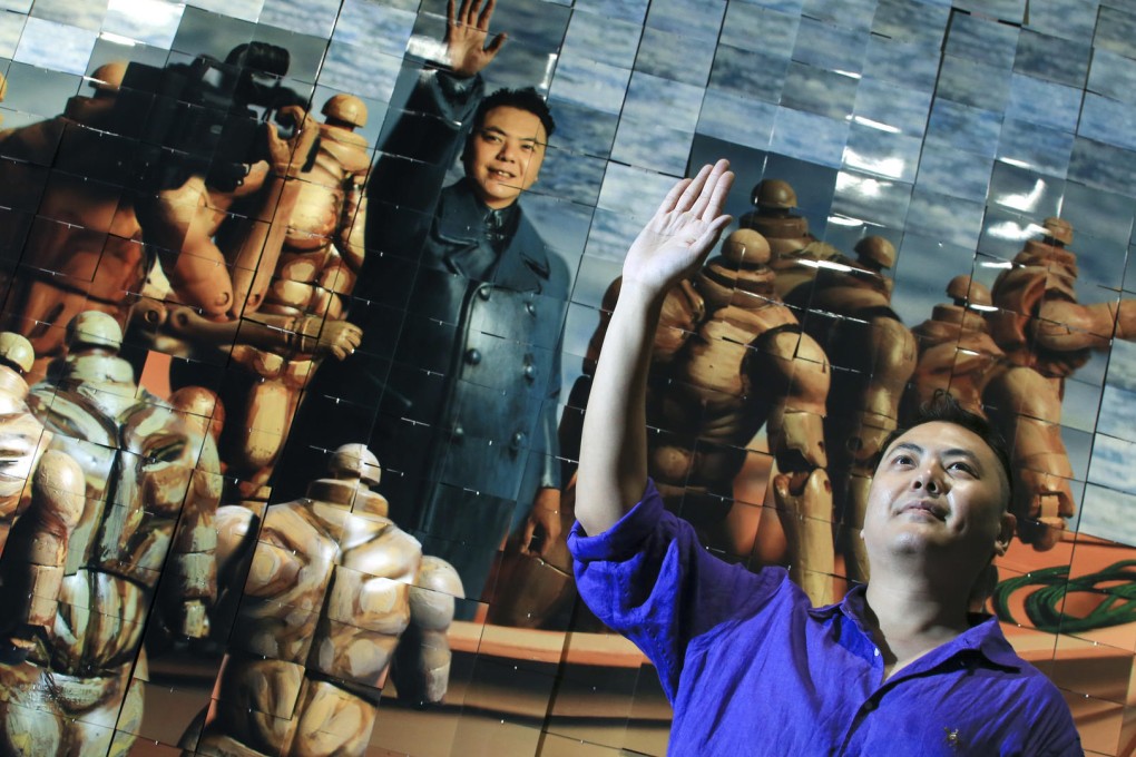 Chow Chun-fai stands before one of his works at the Hanart TZ Gallery. Photo: Felix Wong