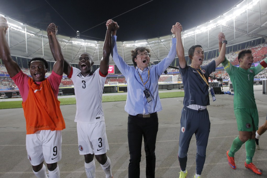 Hong Kong celebrate their draw. Photo: AP