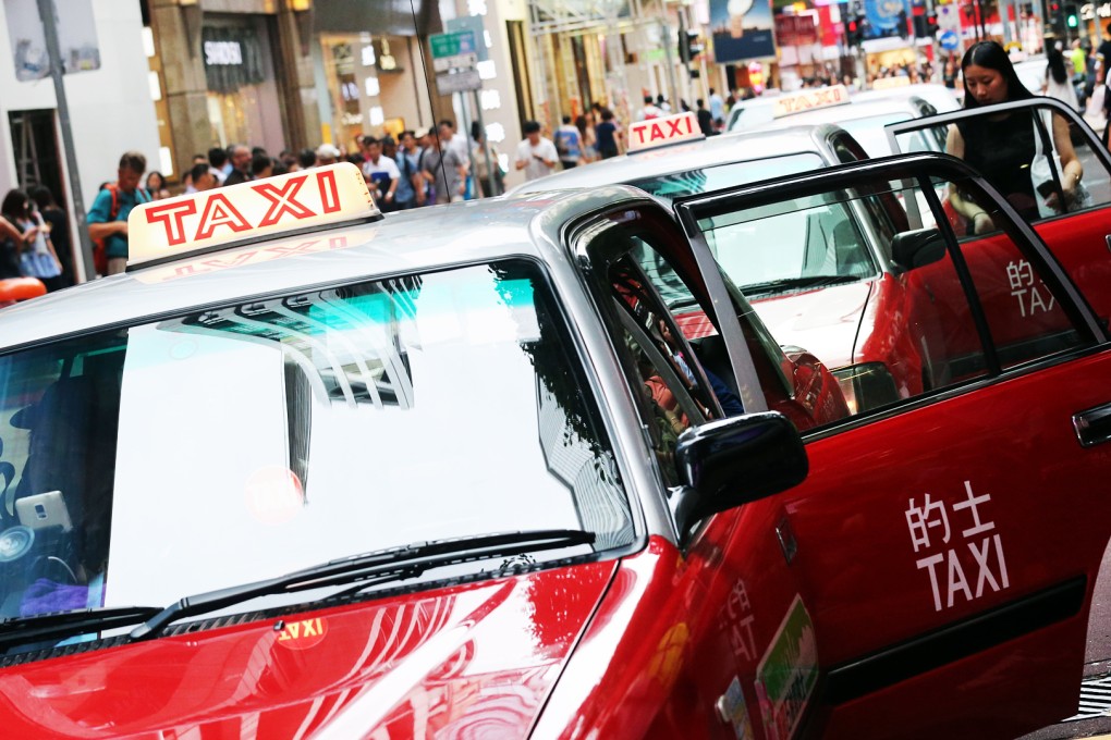 Although the price of a Toyota Crown Comfort taxi is only HK$230,000, the cost of buying a licence to operate one is at present about HK$7 million. Photo: David Wong