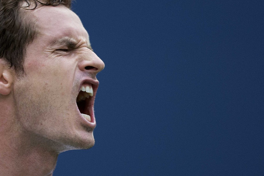 Andy Murray lets out a roar after winning a point against Adrian Mannarino. Photo: Reuters