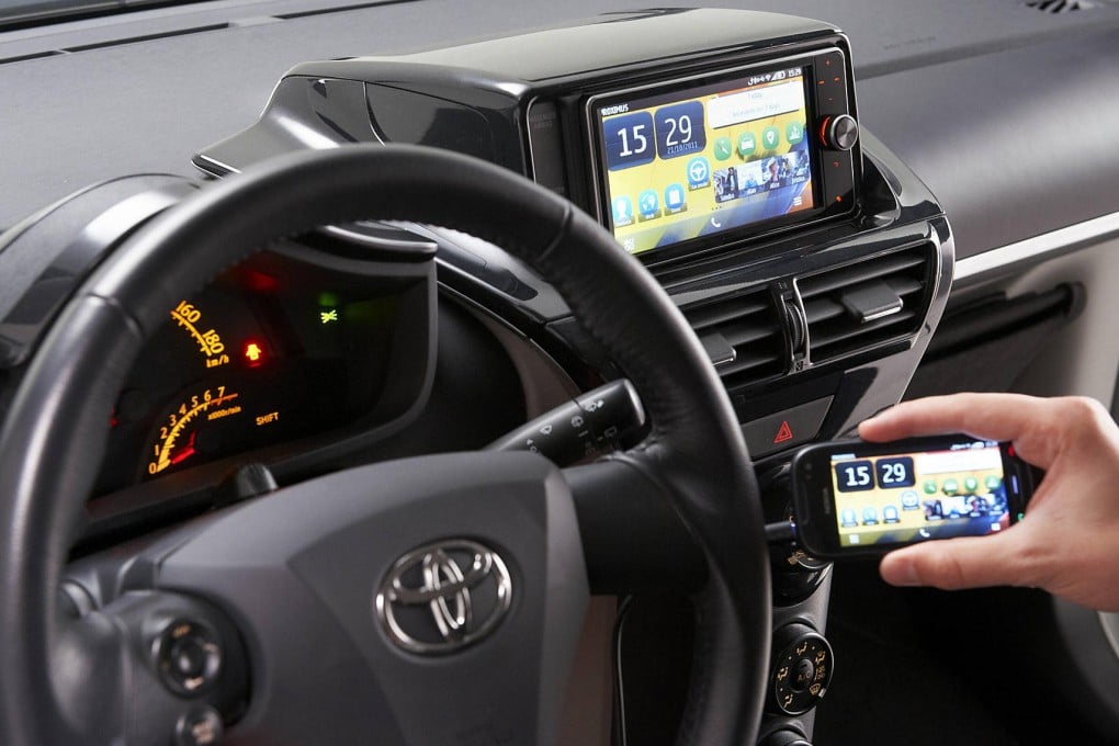 Drivers can turn on voice commands with a touch of a steering wheel button.