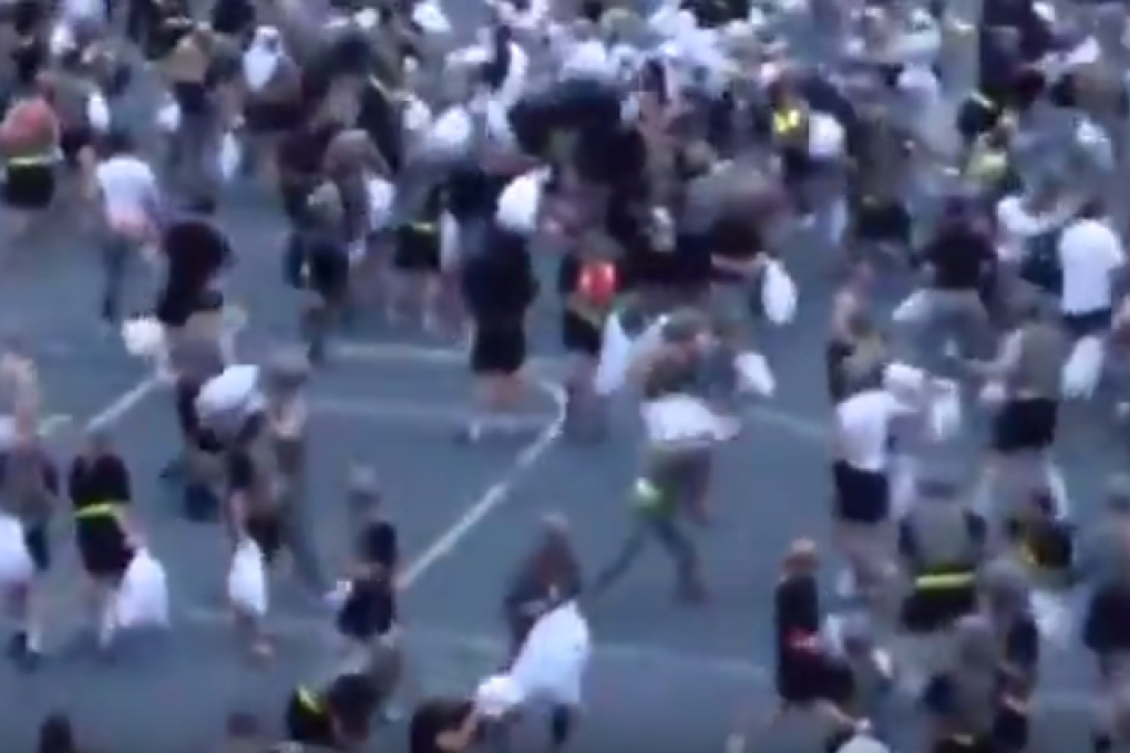 A still from a video showing the pillow fight on August 20. Photo: YouTube
