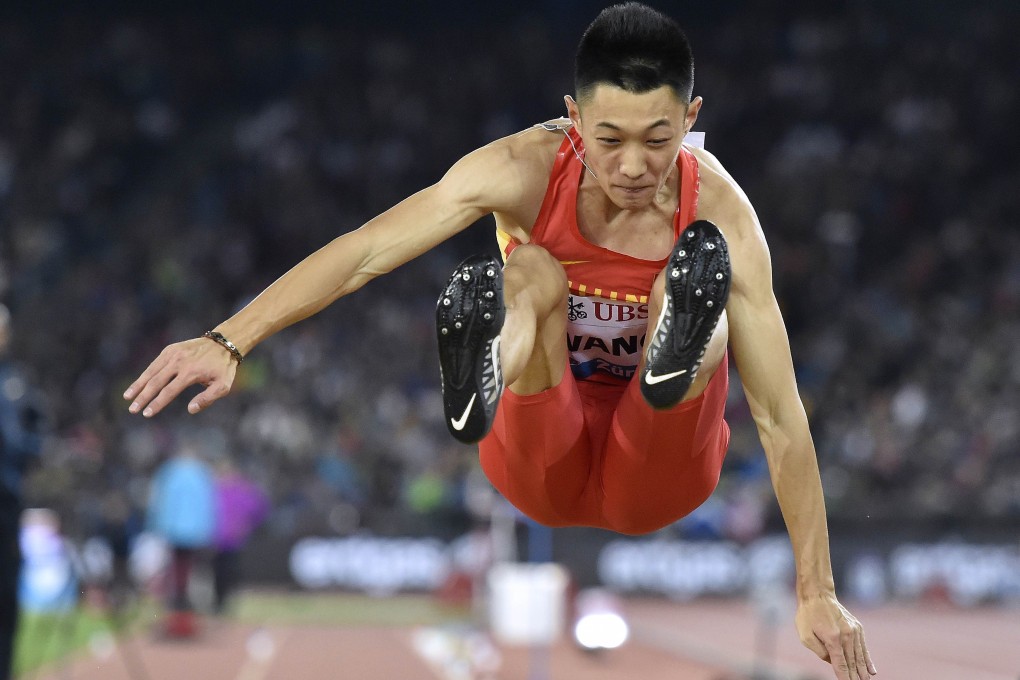 China's Jianan Wang competes in the men's long jump. Photo: AFP