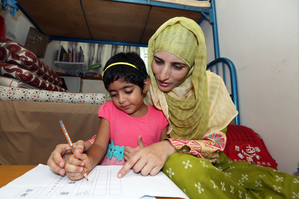 Bushra Khaliq and daughter Aminah Ali Qayyum.Photo: Edward Wong