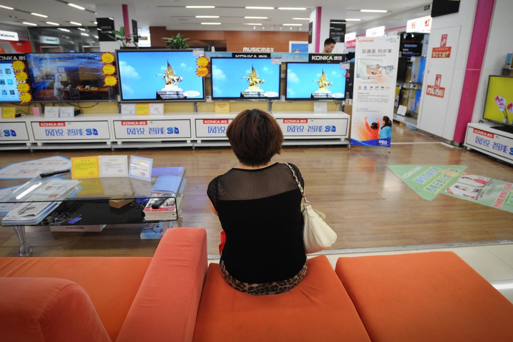 Suning is looking to open the first batch of 40 outlets in Wanda's plazas across China this year. Photo: Xinhua