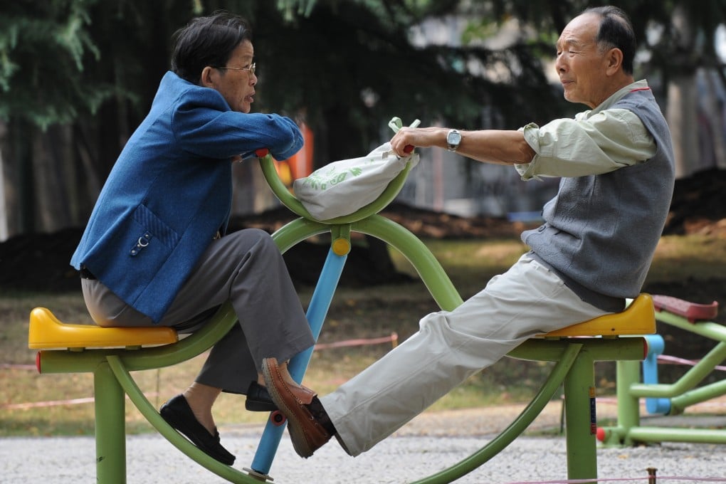 An elderly couple exercises in Shanghai, China. Scientists have discovered that mental activity shifts to the front of the brain as we age. Photo: AFP