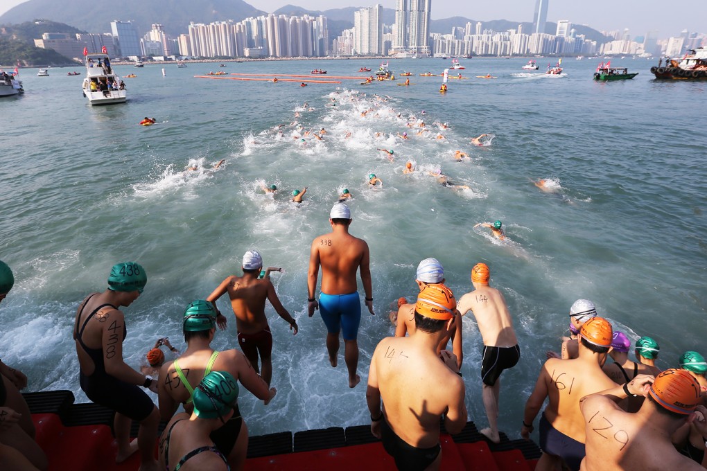 Swimmers compete during the "New World Harbour Race 2014" at Lei Yue Mun Sam Ka. Photo: Sam Tsang