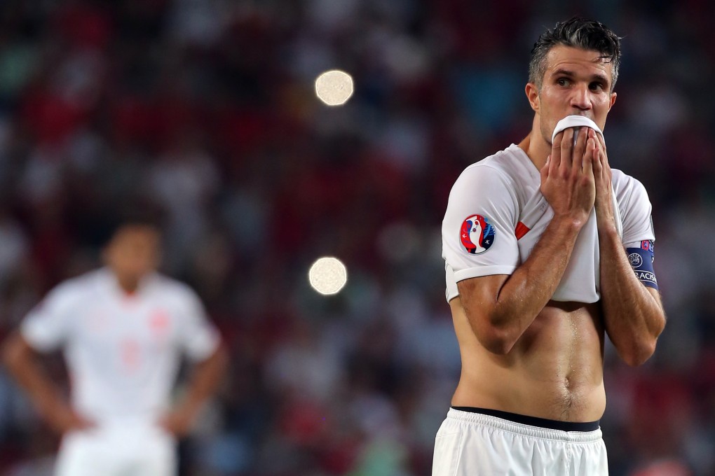 Robin van Persie reacts to the defeat. Photo: AP