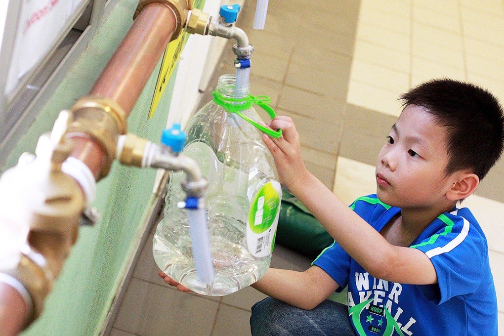 Temporary pipes have been installed at public housing estates amid a tainted water scare. Photo: May Tse