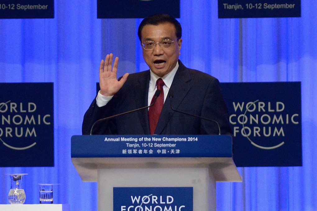 Chinese premier Li Keqiang speaks at the 2014 World Economic Forum summit in Dalian, China. Photo: AFP