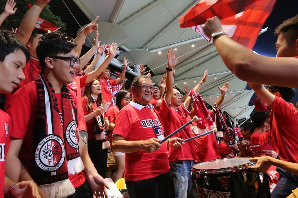 Hong Kong Football Association chairman Brian Leung Hung-tak (middle) and fans cheering the team on. Photo: Edward Wong