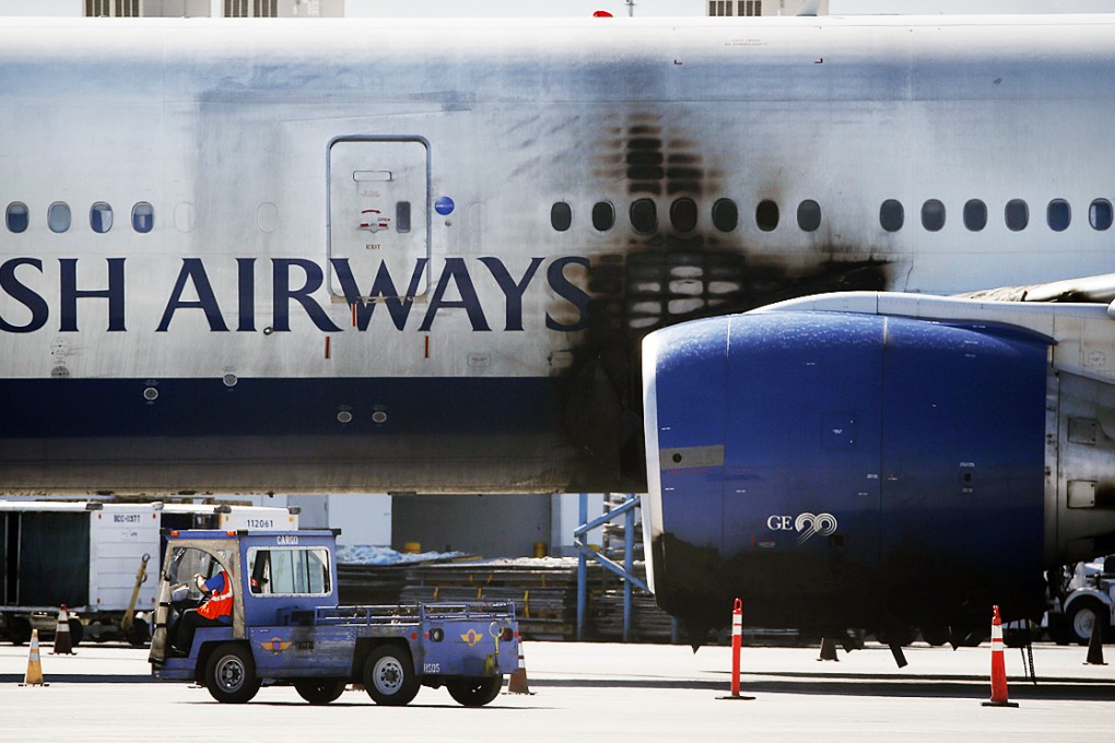 The damaged British Airways Boeing 777-200 sits at McCarran International Airport after an engine caught fire before takeoff. Photo: AP