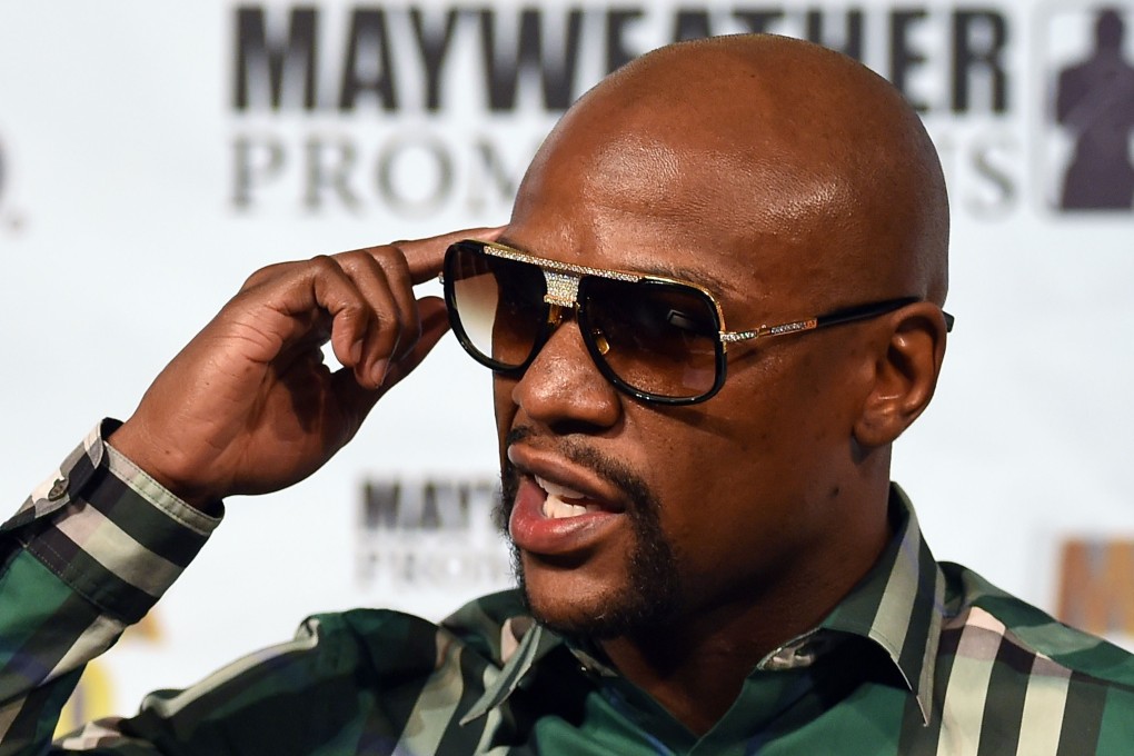 Floyd Mayweather holds court. Photo: AFP