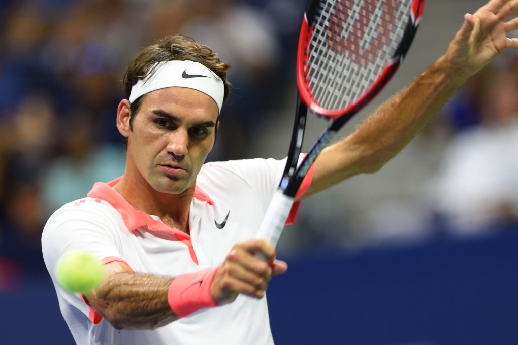 Roger Federer hits a backhand. Photo: AFP