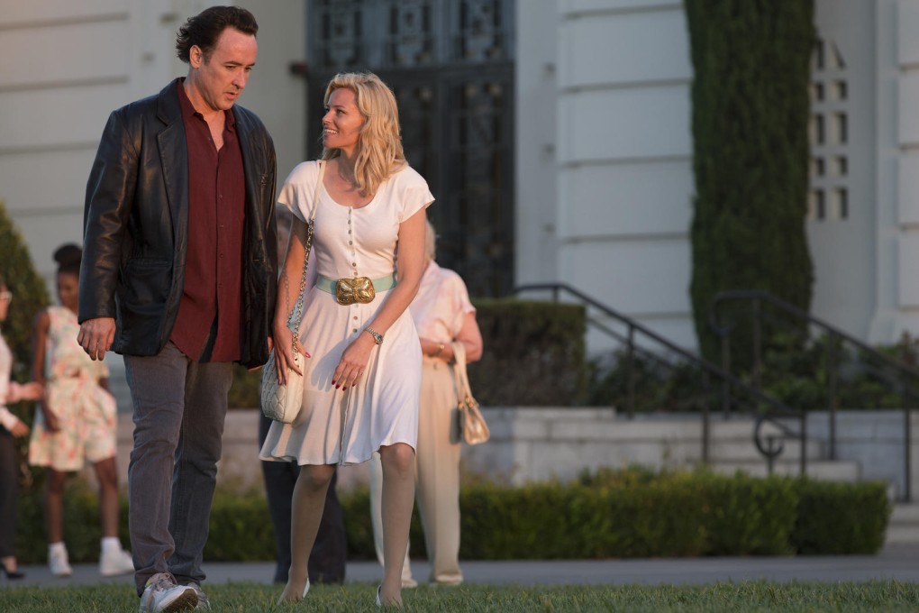 John Cusack and Elizabeth Banks as Brian Wilson and Melinda Ledbetter, in the Beach Boy's biopic Love & Mercy.