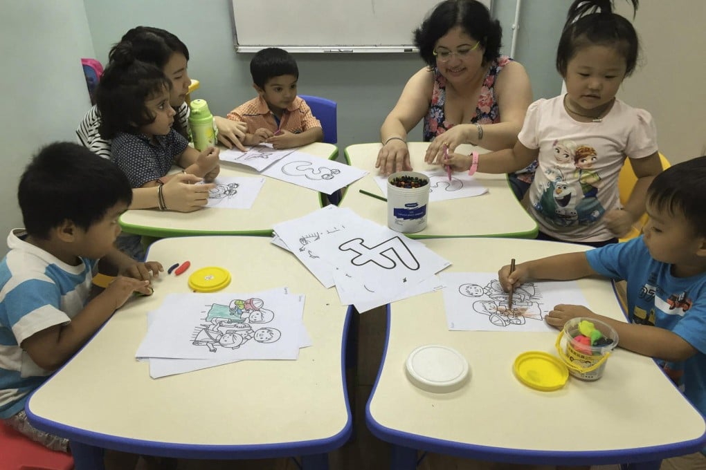 Students and teachers in the kindergarten section of Integrated Brilliant Education Trust (IBET) at the Jordan centre. Photo: IBET