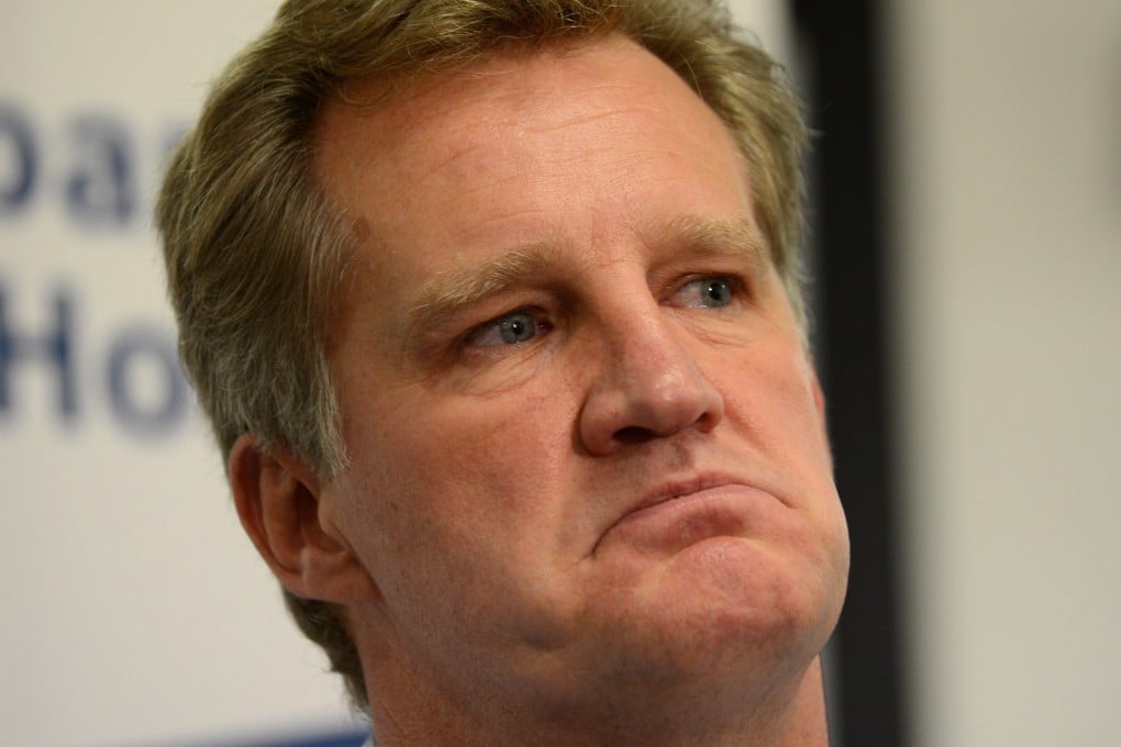 Michael Lynagh speaks to the media at Royal Brisbane Hospital in 2012 after two weeks battling to survive stroke. Photo: EPA