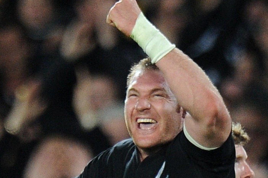 All Blacks lock Ali Williams (right) celebrates with Andrew Hore after New Zealand defeated France to win the 2011 Rugby World Cup final on home soil. Photo: AFP