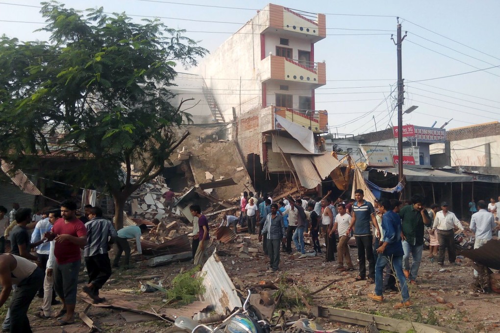 A cooking gas cylinder blew up in a packed restaurant when people, including school children, were having breakfast. Photo: AFP