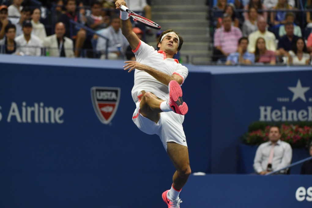 Roger Federer returns to Stan Wawrinka. Photo: AFP