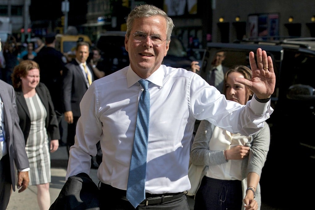 After filming the debut show of Stephen Colbert on Tuesday in New York, Republican candidate Jeb Bush gave a video call to donors. Photo: Reuters