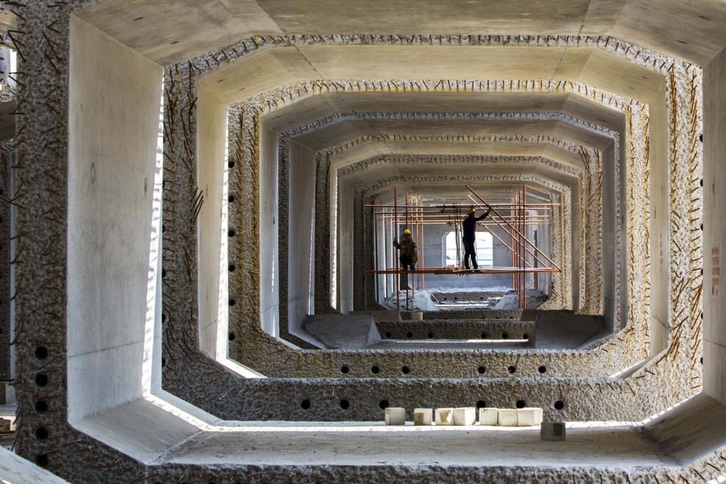Fixed-asset investment growth has slowed. Photo: Reuters